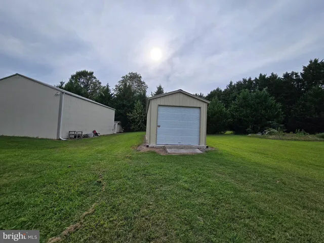 a fire hydrant in the middle of a field