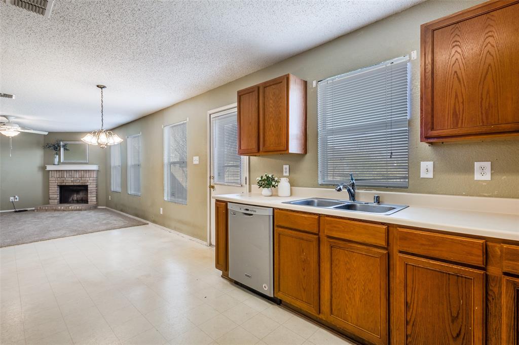 2532 Timberbrook Trail McKinney, TX 75071 - Photo 12 of 32 a spacious bathroom with a granite countertop sink mirror and a