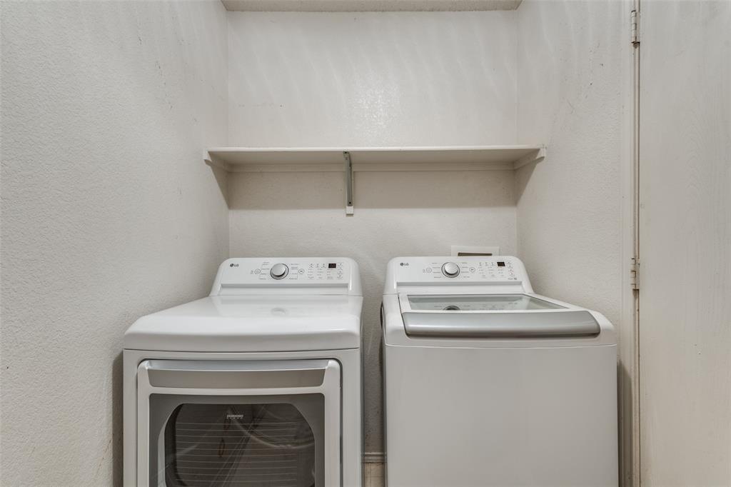 2532 Timberbrook Trail McKinney, TX 75071 - Photo 17 of 32 a utility room with dryer and washer