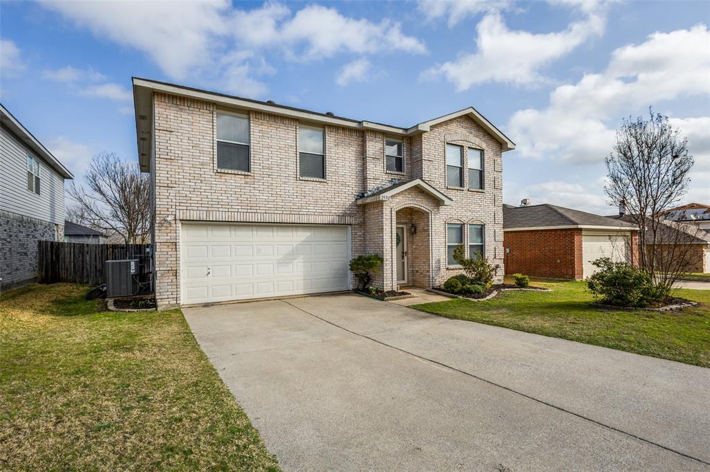 2532 Timberbrook Trail McKinney, TX 75071 - Photo 2 of 32 a front view of a house with a yard and garage