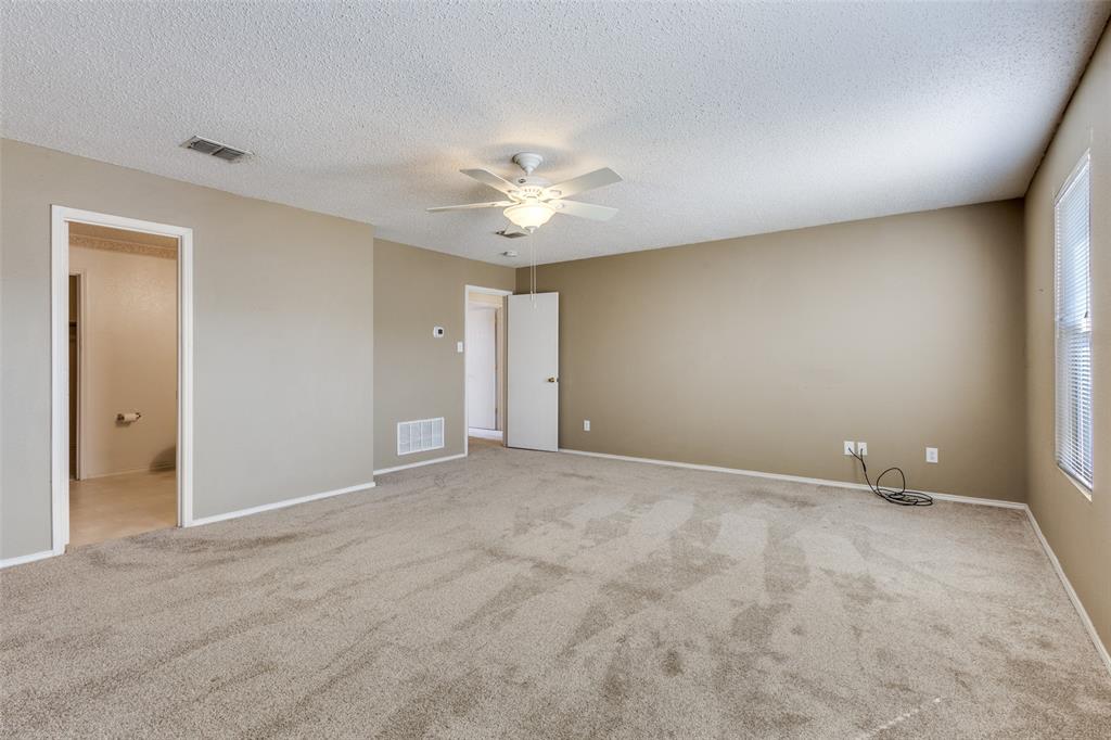 2532 Timberbrook Trail McKinney, TX 75071 - Photo 21 of 32 a view of an empty room with a window