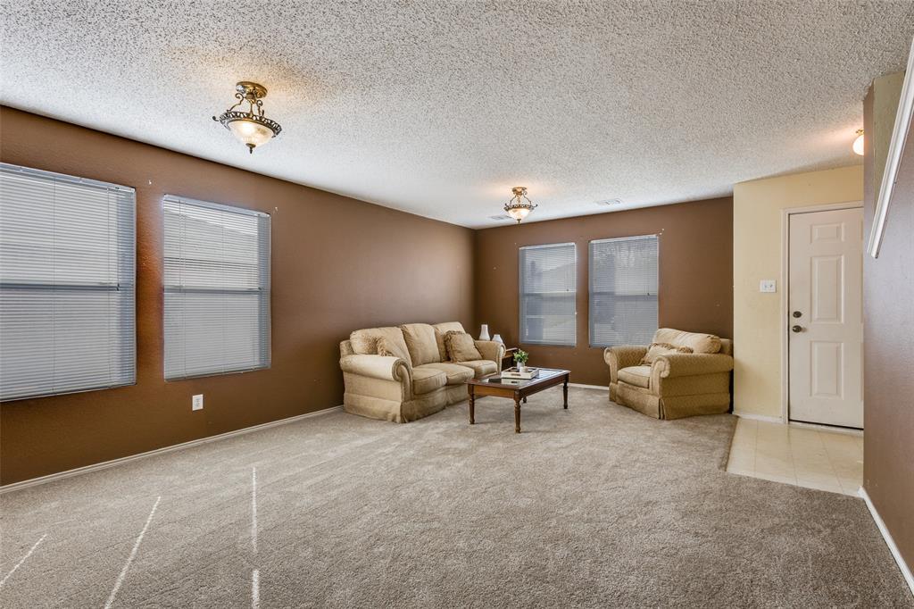 2532 Timberbrook Trail McKinney, TX 75071 - Photo 4 of 32 a living room with furniture and a window