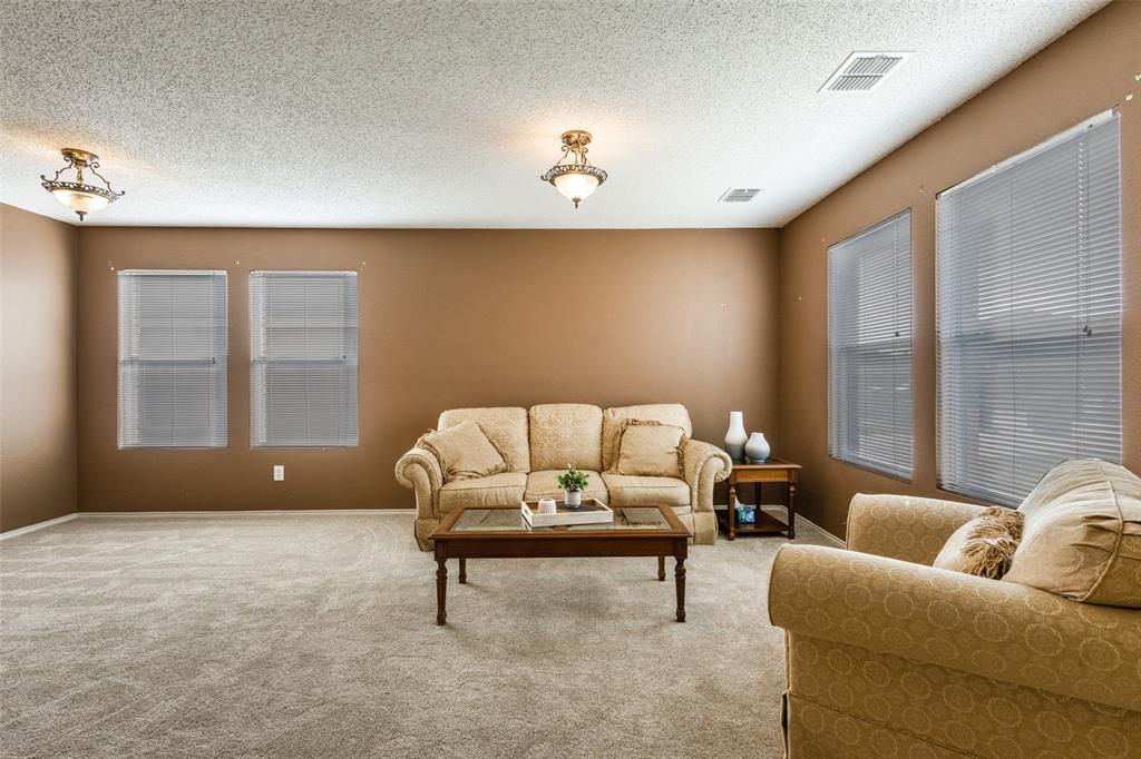 2532 Timberbrook Trail McKinney, TX 75071 - Photo 5 of 32 a living room with furniture and a window