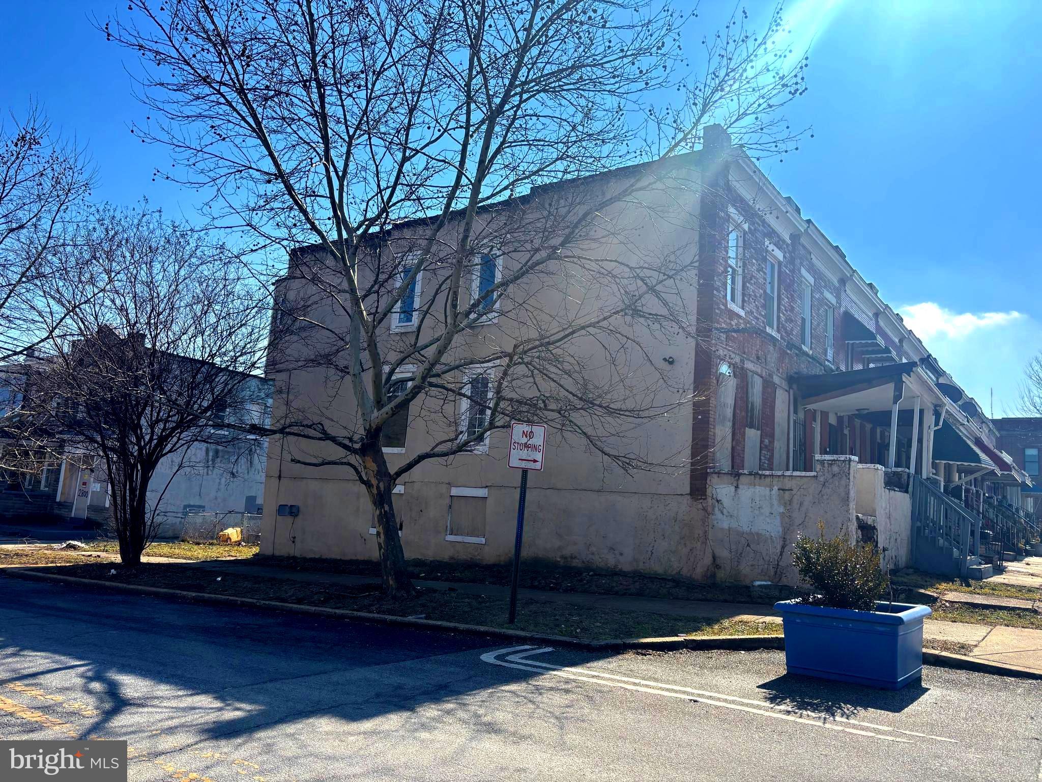 a view of house with outdoor space and sitting area