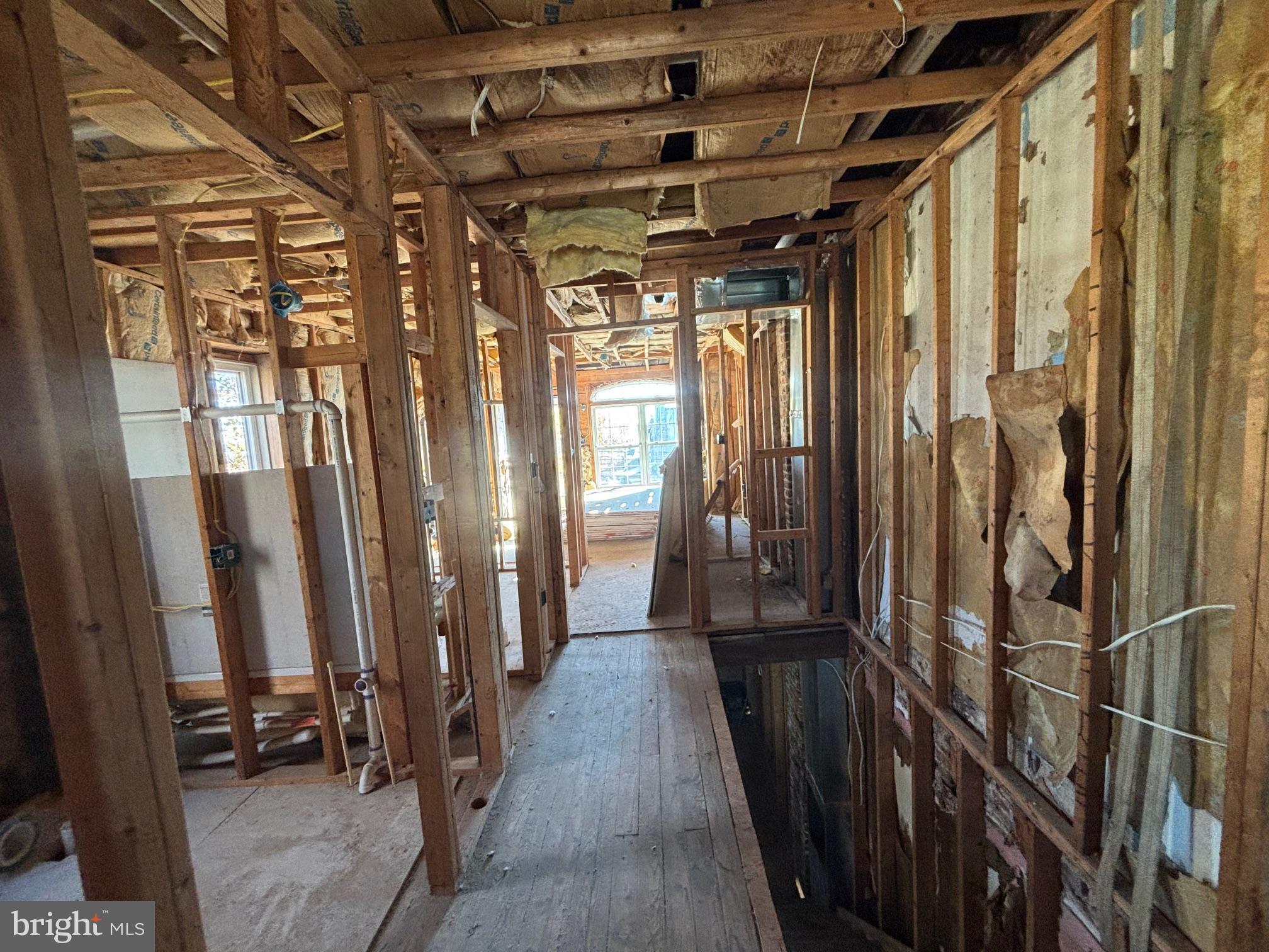 2401 Annapolis Road Baltimore, MD 21230 - Photo 11 of 14 a view of a hallway with wooden walls
