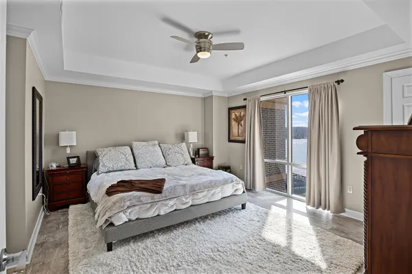 a view of a balcony with mountain view and wooden floor