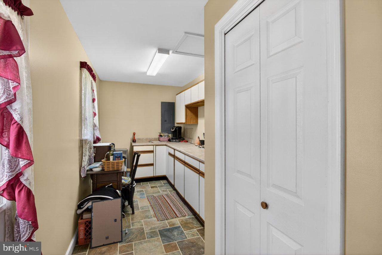 1751 Orchard Road Mount Jackson, VA 22842 - Photo 9 of 30 a kitchen with a sink appliances and cabinets