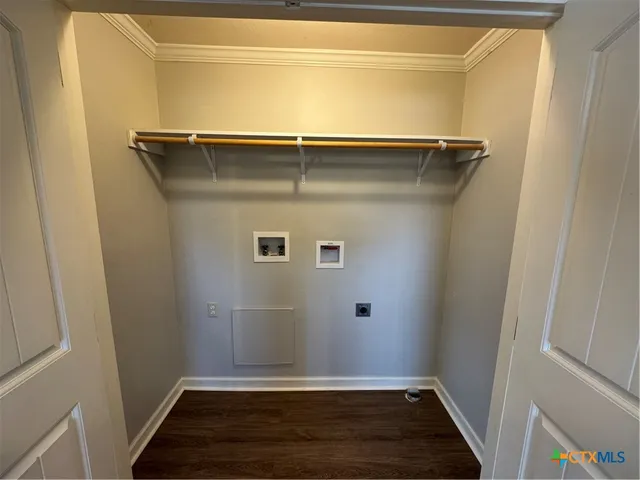 a bathroom with a sink toilet and mirror