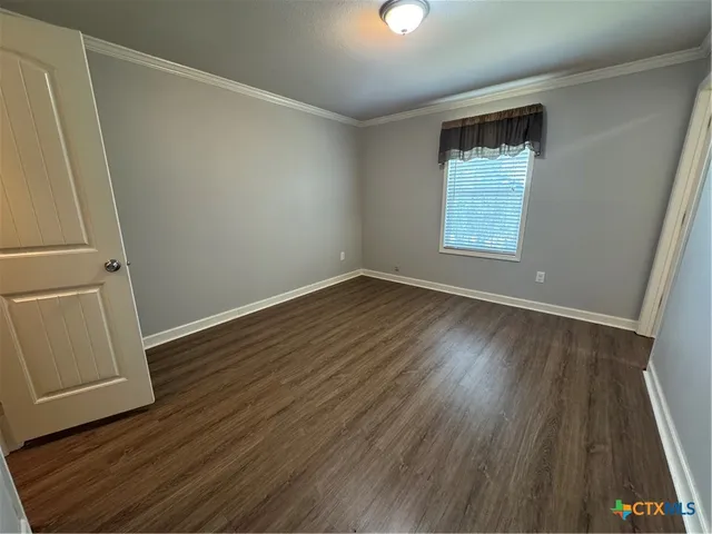 a bathroom with a bathtub and a sink