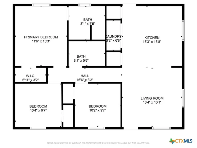 a view of a house with a small yard and wooden floor