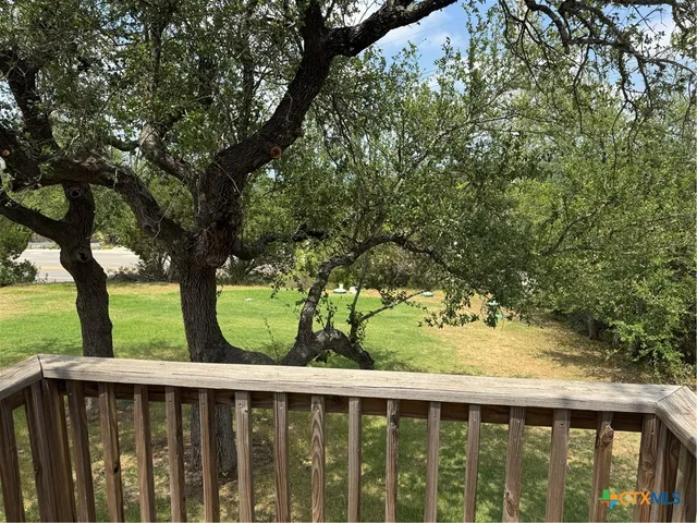 a view of deck with a yard