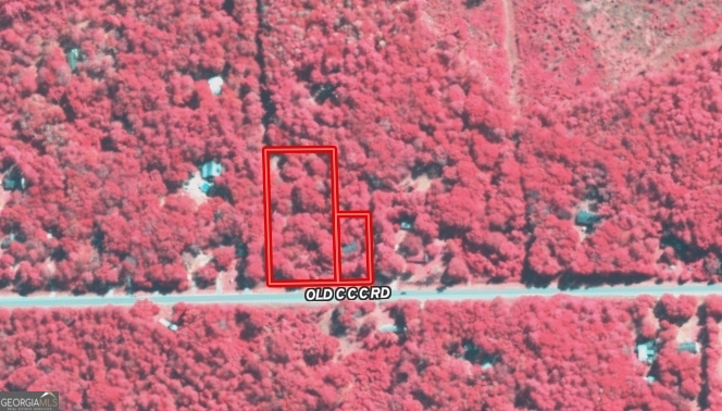 638-628 Old C C C Road Brunswick, GA 31523 - Photo 5 of 10 a view of a bench in a yard