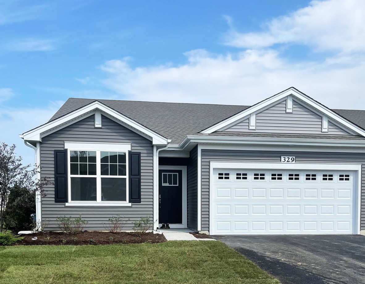 906 Homerton Boulevard North Aurora, IL 60542 - Photo 1 of 63 front view of a house