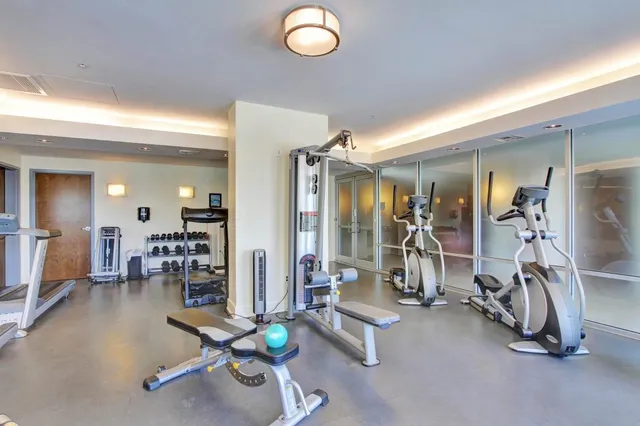 a view of a room with gym equipment