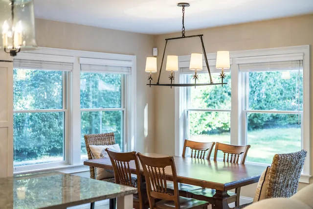 a view of a living room kitchen and a couch