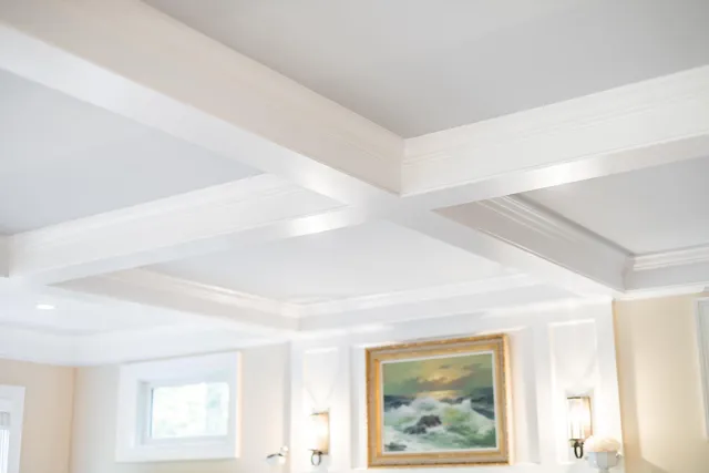 a spacious bedroom with furniture and a couch