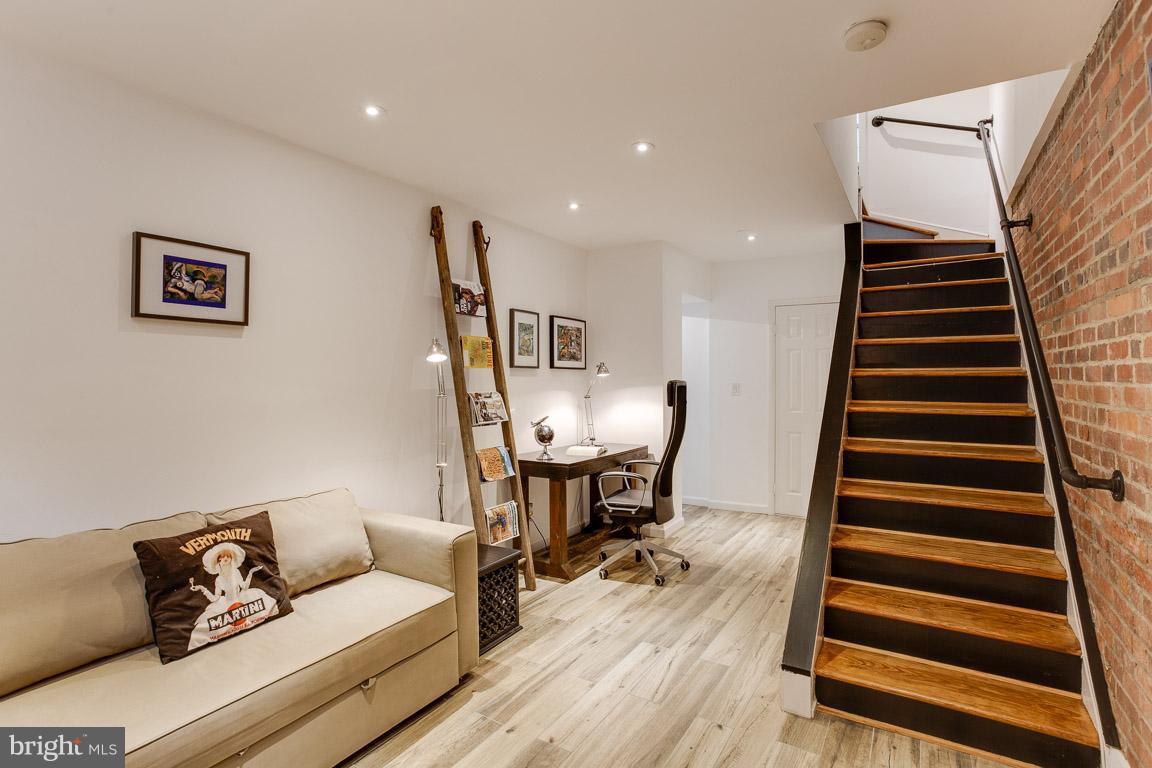 4914 29th Road South, Unit A2 Arlington, VA 22206 - Photo 18 of 30 a living room with furniture and wooden floor