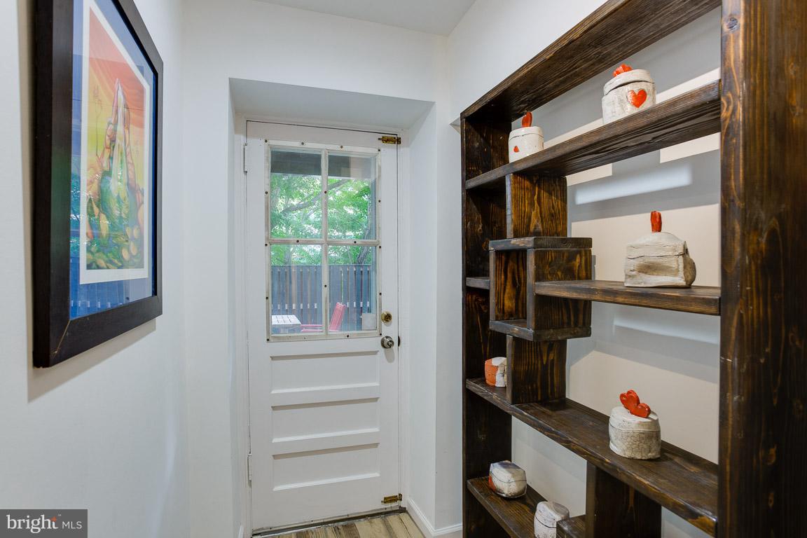 4914 29th Road South, Unit A2 Arlington, VA 22206 - Photo 22 of 30 a view of walk in closet with clothes and shoes