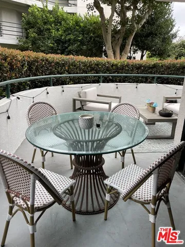 a kitchen with granite countertop a sink and a stove