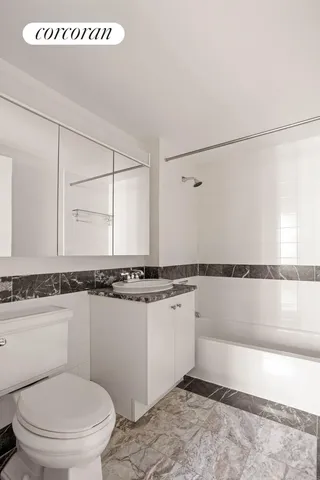 a view of a city with water and tall buildings