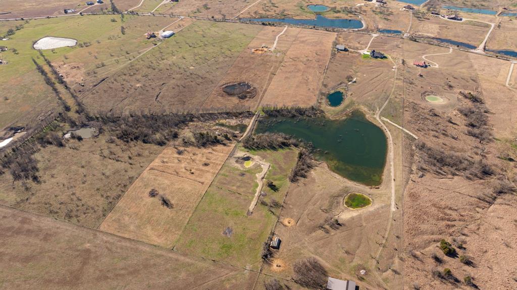 Tbd Alsdorf Road Ennis, TX 75119 - Photo 11 of 18 a bathroom with a sink and mirror