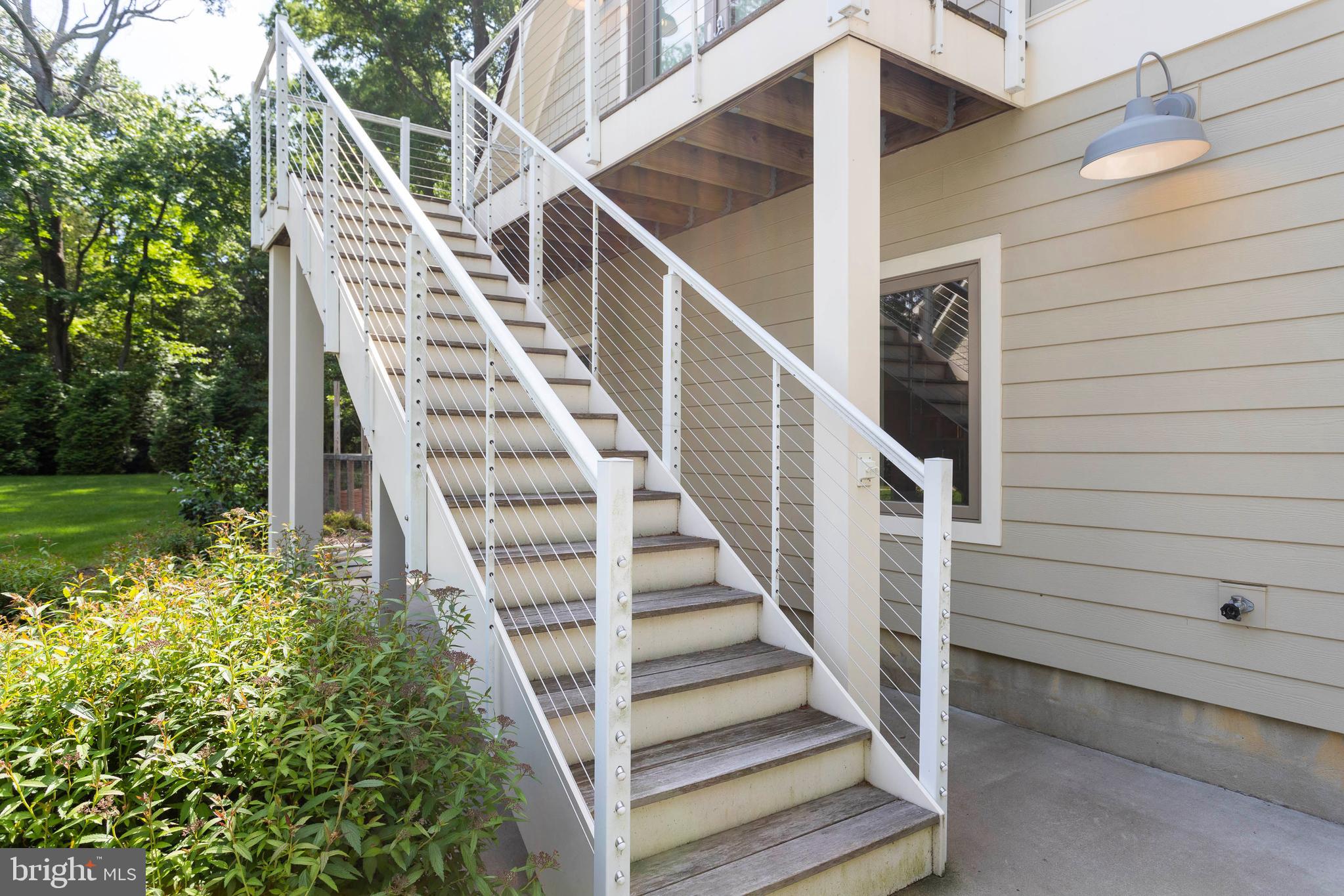 1439 Chancellor Point Road Trappe, MD 21673 - Photo 20 of 47 Stairway to Guest Quarters