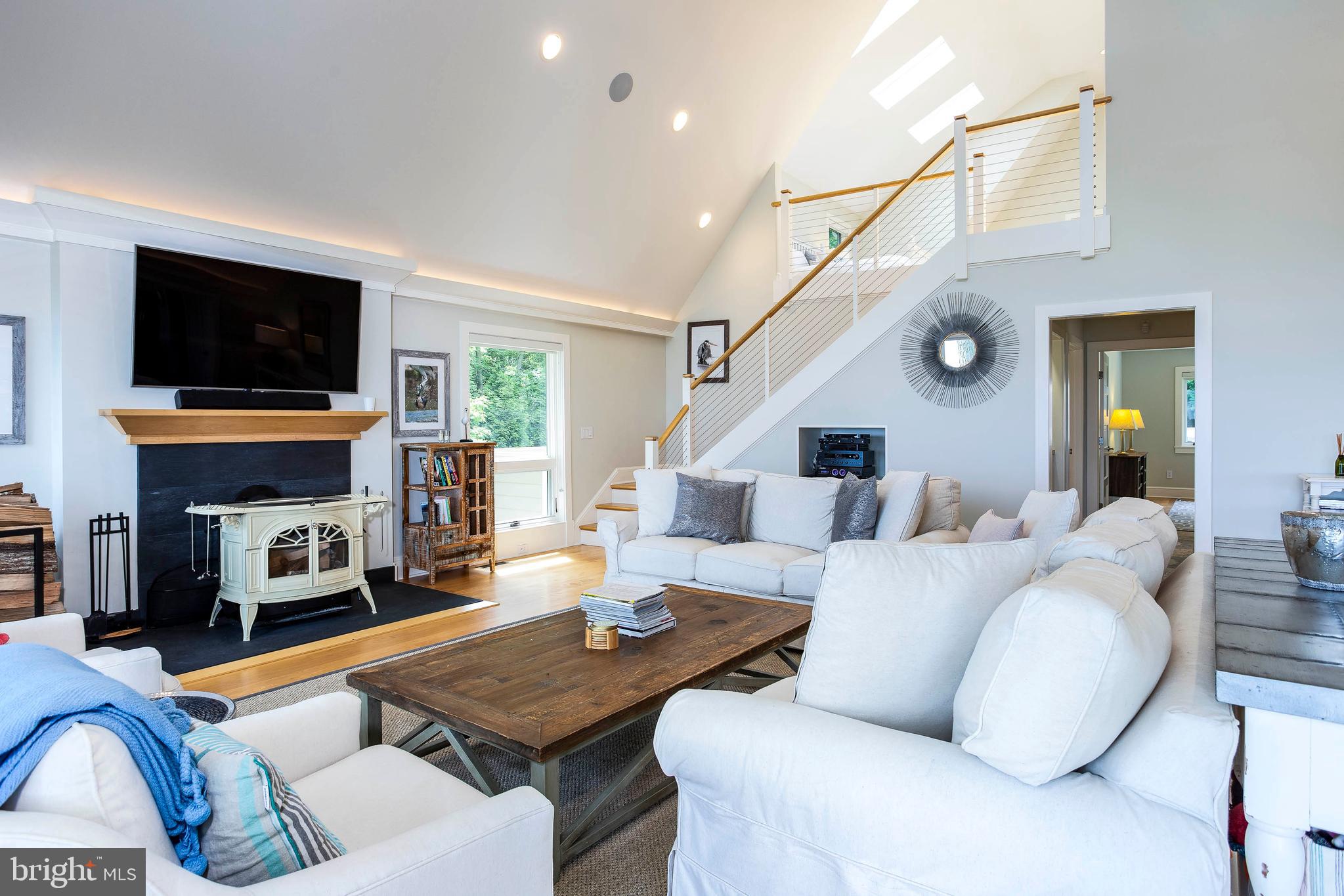 1439 Chancellor Point Road Trappe, MD 21673 - Photo 31 of 47 Great room w/ wood stove & water view of the River