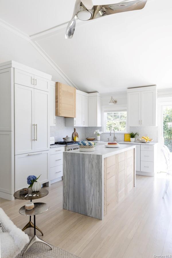 48 Middle Pond Road Southampton, NY 11968 - Photo 7 of 22 a kitchen with a sink cabinets and window