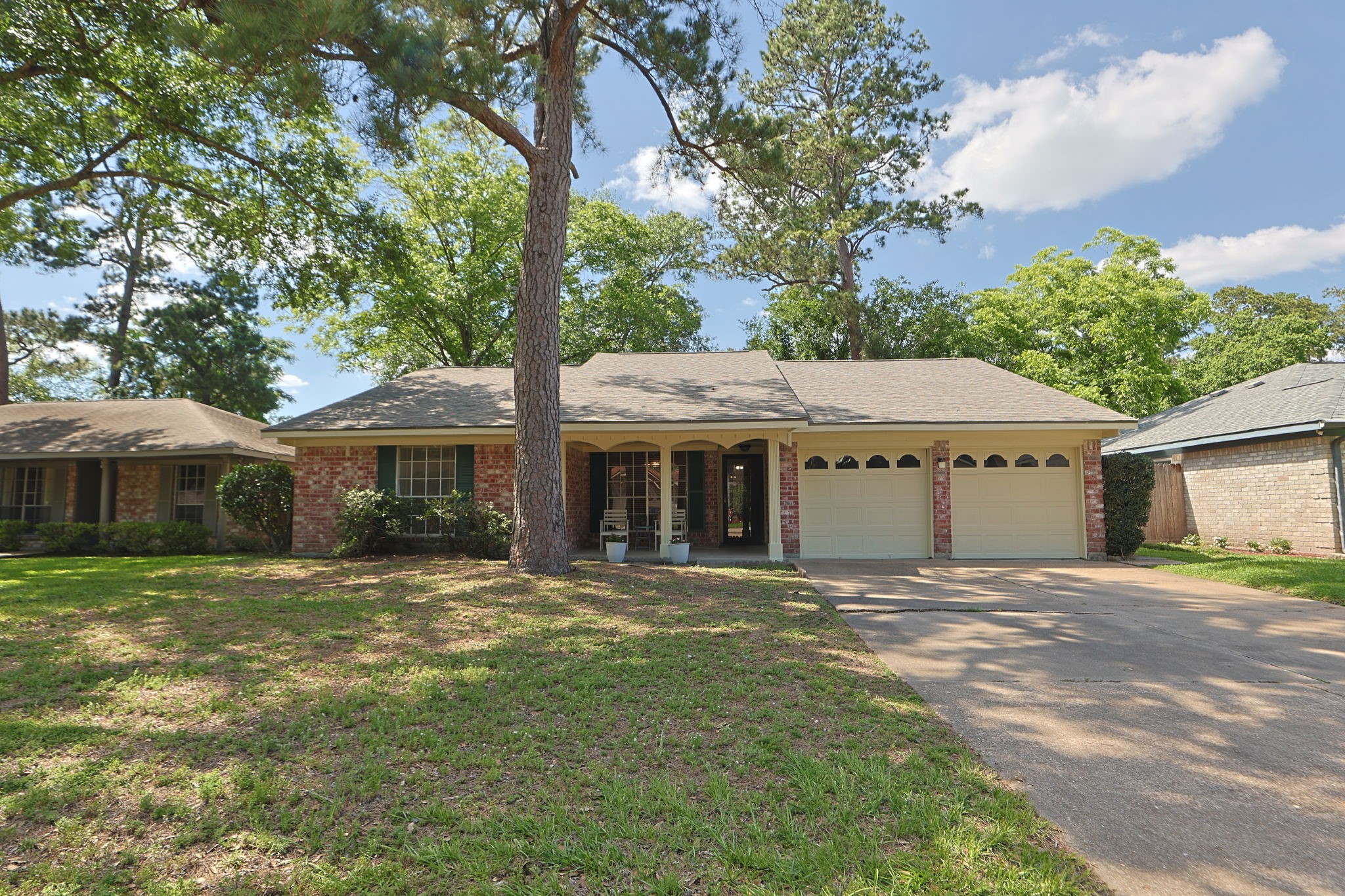 9618 Rannock Way Spring, TX 77379 - Photo 1 of 24 a front view of a house with a garden