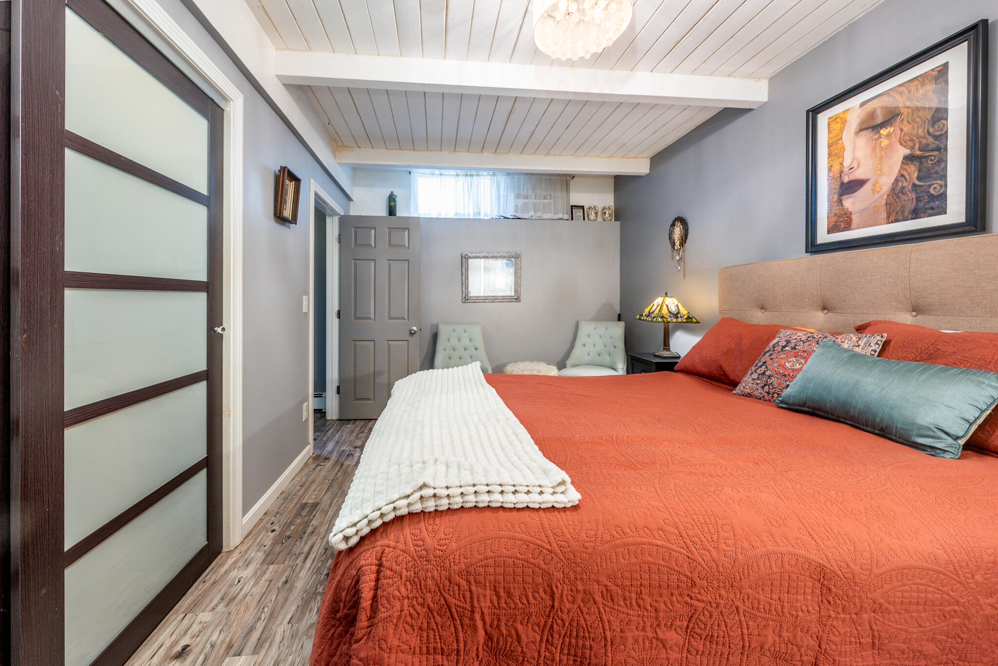 34 Erics Way, Unit G 7 Wellfleet, MA 02667 - Photo 13 of 24 a bedroom with a large bed and a large window