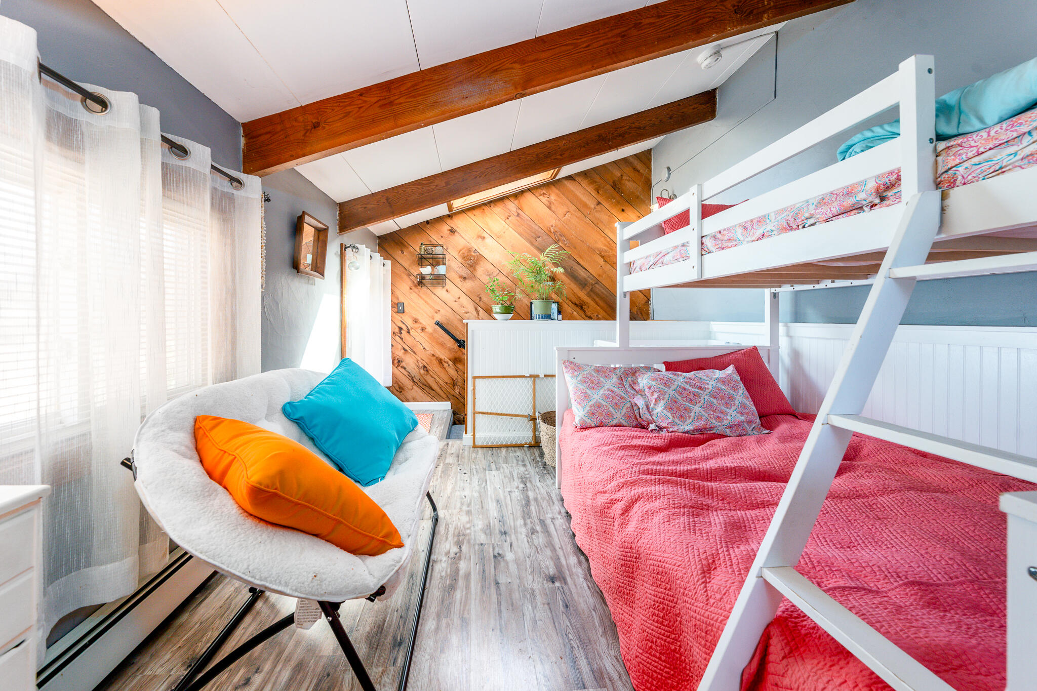 34 Erics Way, Unit G 7 Wellfleet, MA 02667 - Photo 16 of 24 a bed room with a bed window and a chair