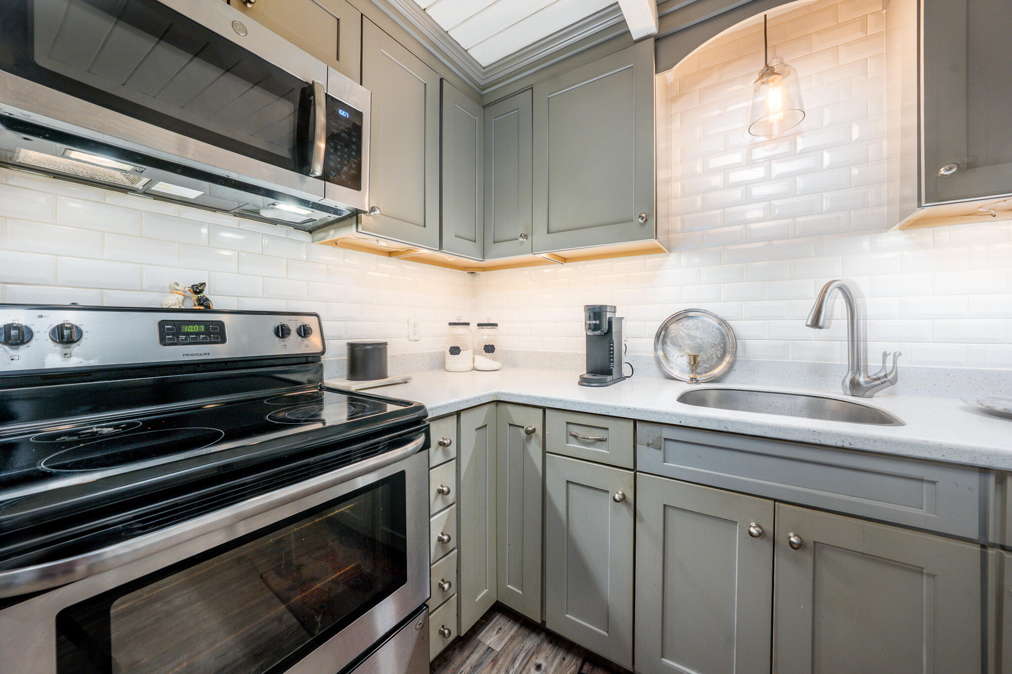 34 Erics Way, Unit G 7 Wellfleet, MA 02667 - Photo 8 of 24 a kitchen with appliances cabinets and a window