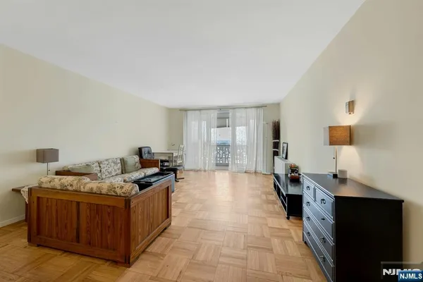 a bed room with a bed and a window