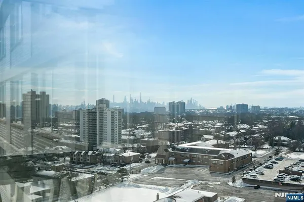 a view of a balcony with city view