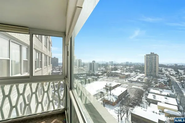 a view of a city with tall buildings in the background