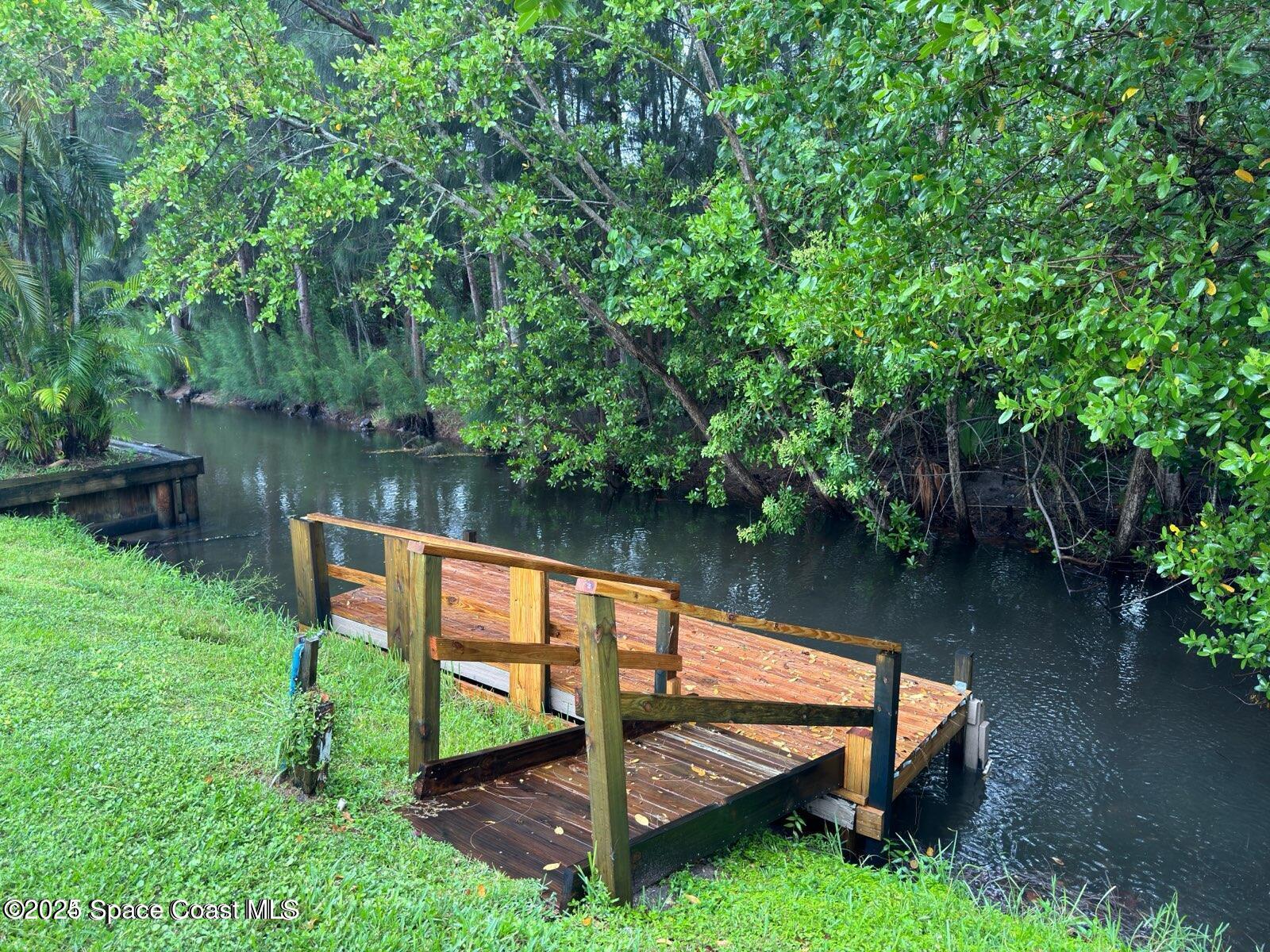 332 Nikomas Way Melbourne Beach, FL 32951 - Photo 25 of 63 canal full - photo