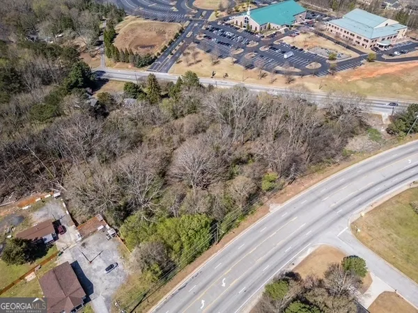 a view of swimming pool with a yard