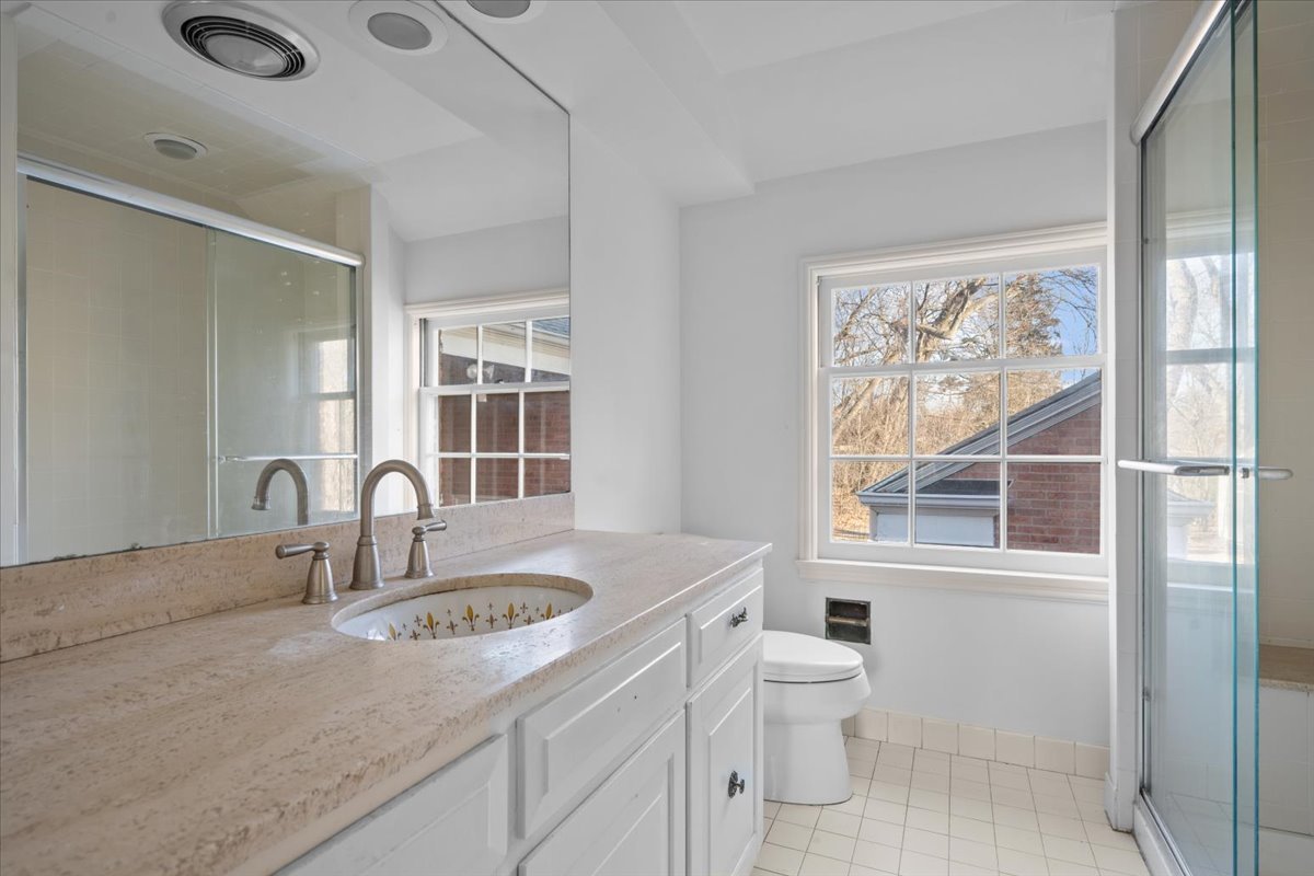 262 Foster Place Lake Forest, IL 60045 - Photo 16 of 27 a kitchen with a sink a toilet and a large window