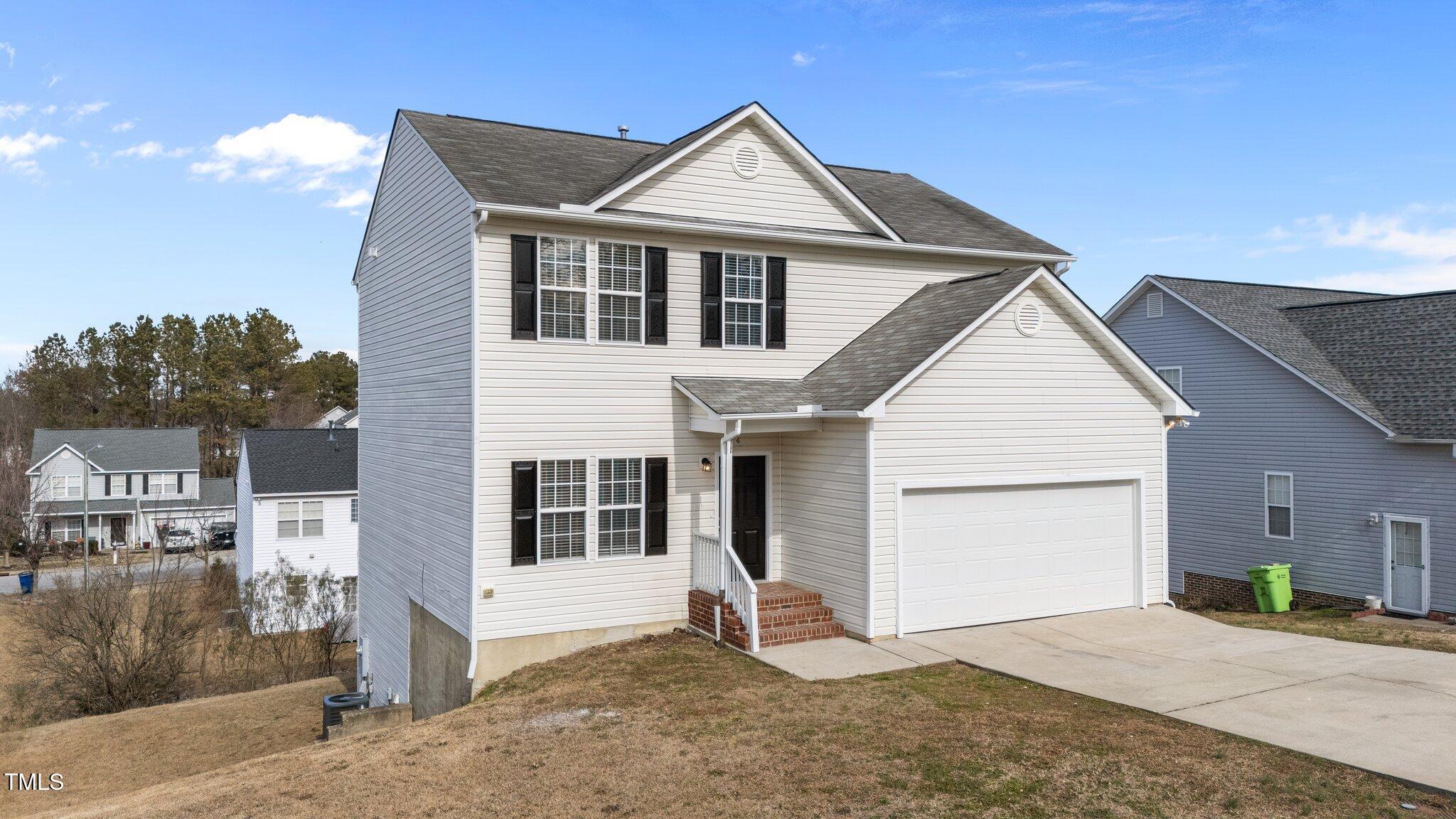 7041 Spanglers Spring Way Raleigh, NC 27610 - Photo 3 of 44 3-web-or-mls-DJI_20250124123043_0982_D