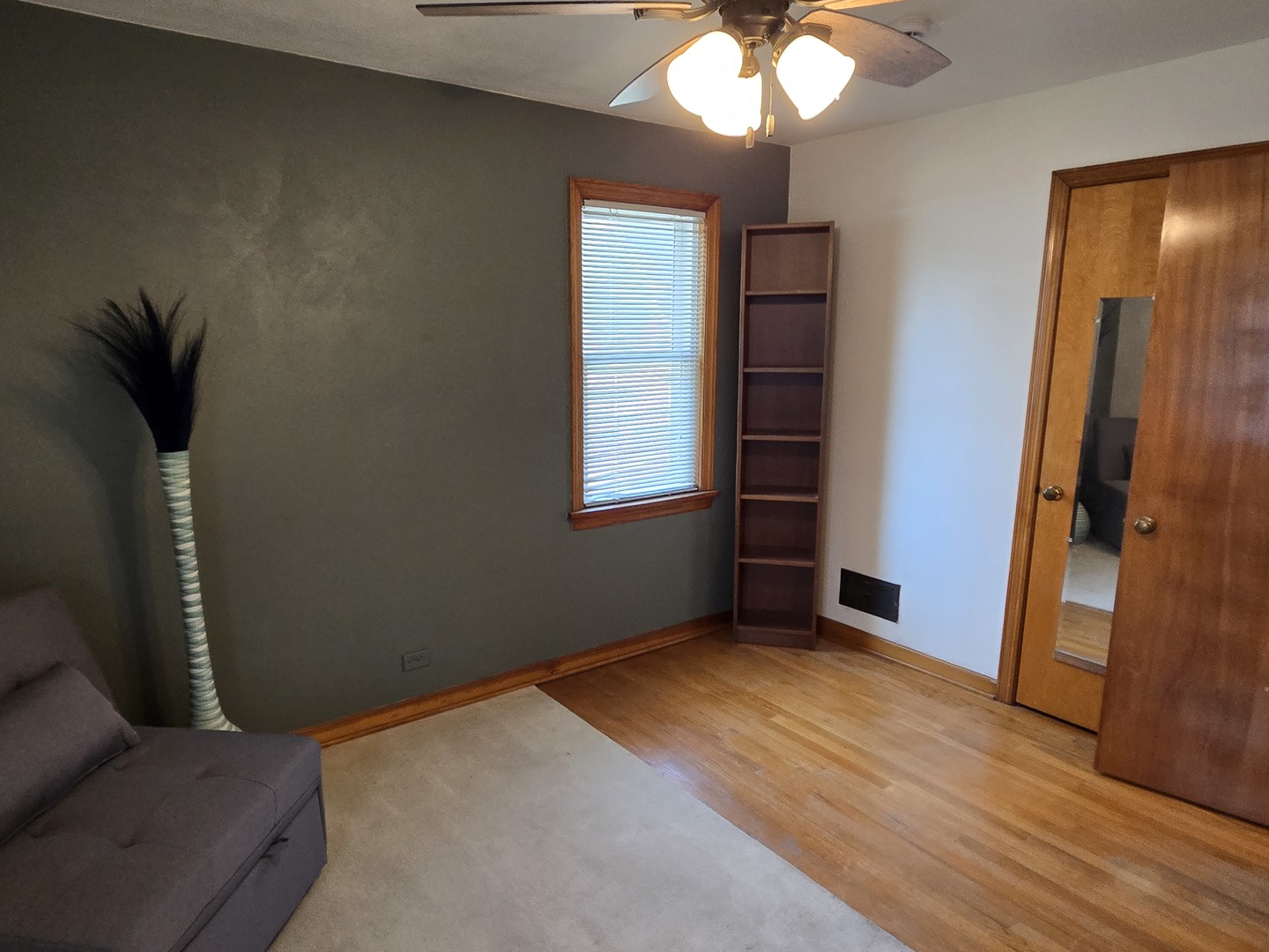 14558 Turner Avenue Midlothian, IL 60445 - Photo 15 of 20 a view of an empty room with wooden floor and a window