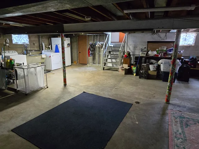 a backyard of a house with yard and outdoor seating