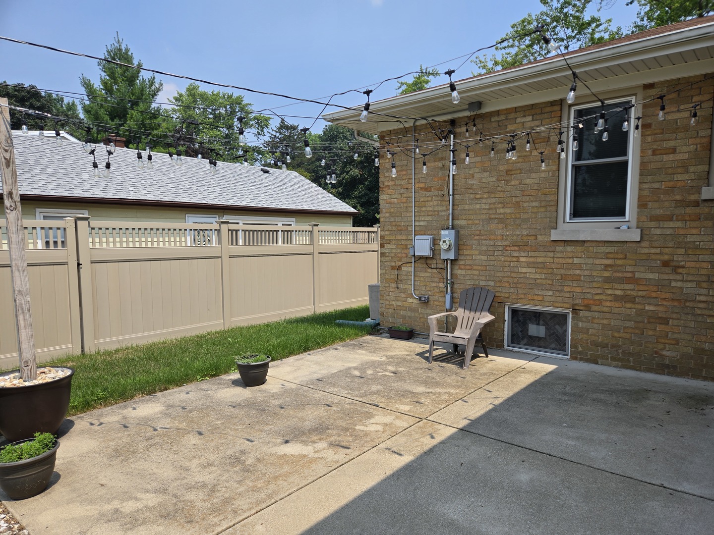 14558 Turner Avenue Midlothian, IL 60445 - Photo 19 of 20 a backyard of a house with yard and outdoor seating