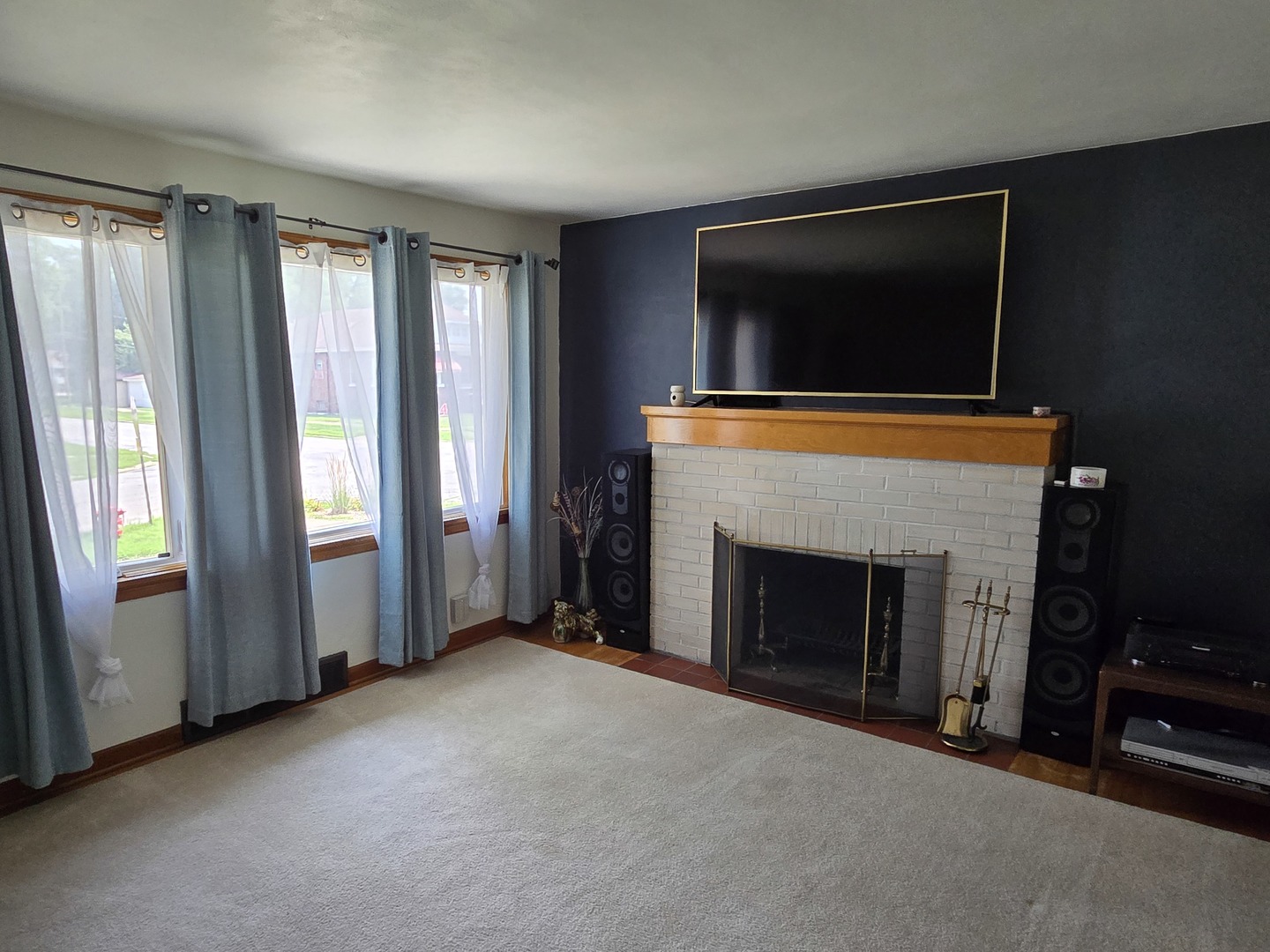 14558 Turner Avenue Midlothian, IL 60445 - Photo 2 of 20 a living room with furniture and a fireplace