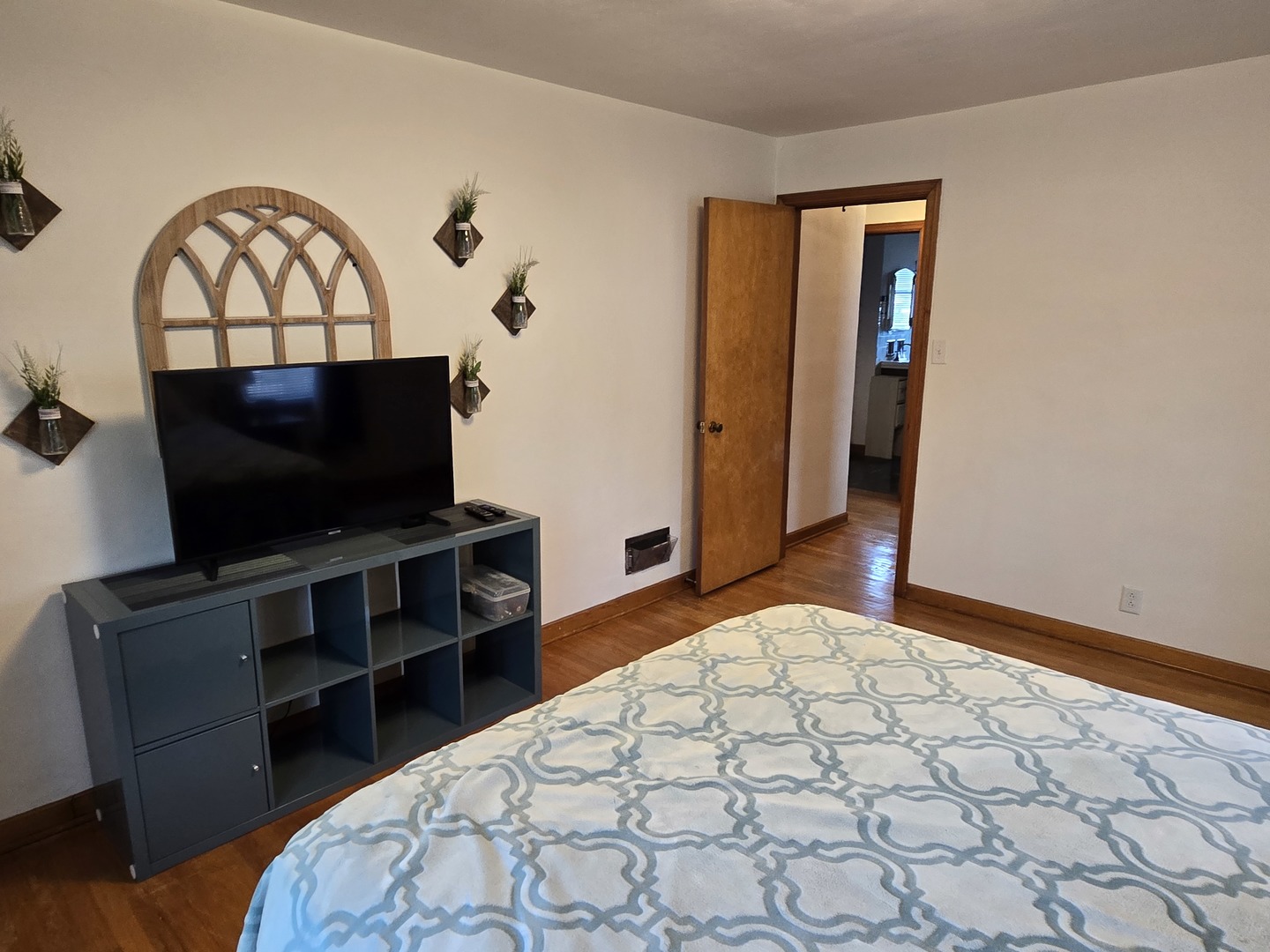 14558 Turner Avenue Midlothian, IL 60445 - Photo 8 of 20 a bedroom with a bed and a flat screen tv