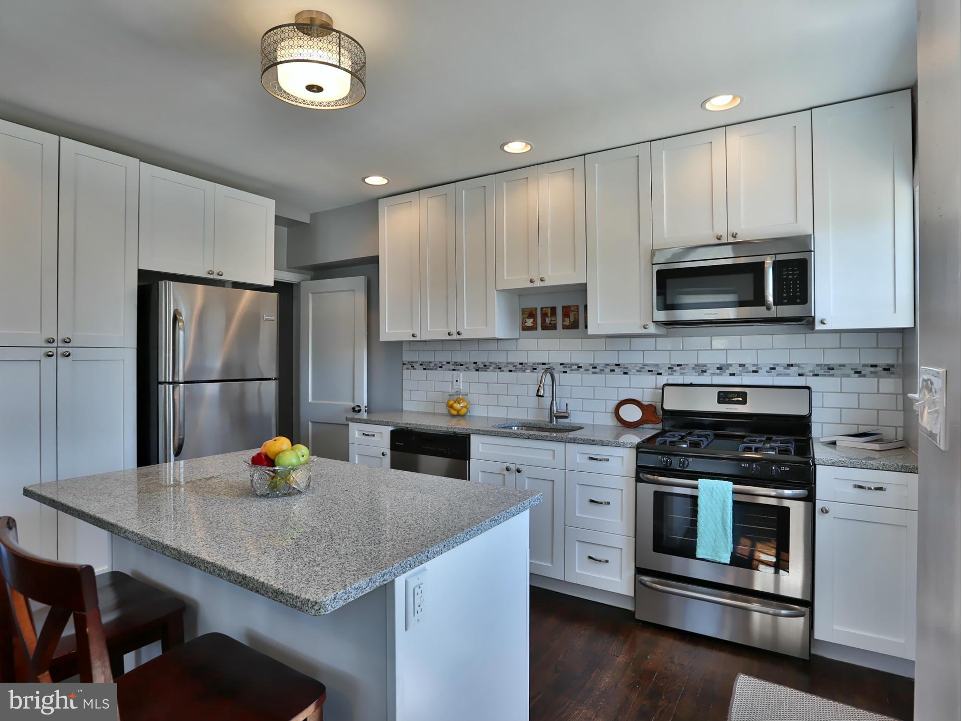 1201 Gleneagle Road Baltimore, MD 21239 - Photo 10 of 30 Granite Counters, Tile Backsplash & SS Appliances