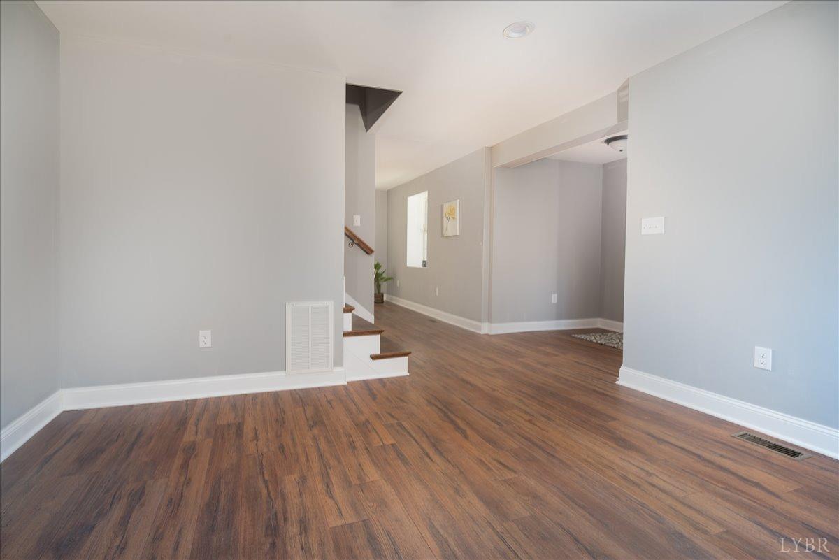132 Spring Street Madison Heights, VA 24572 - Photo 21 of 63 wooden floor in an empty room with a window