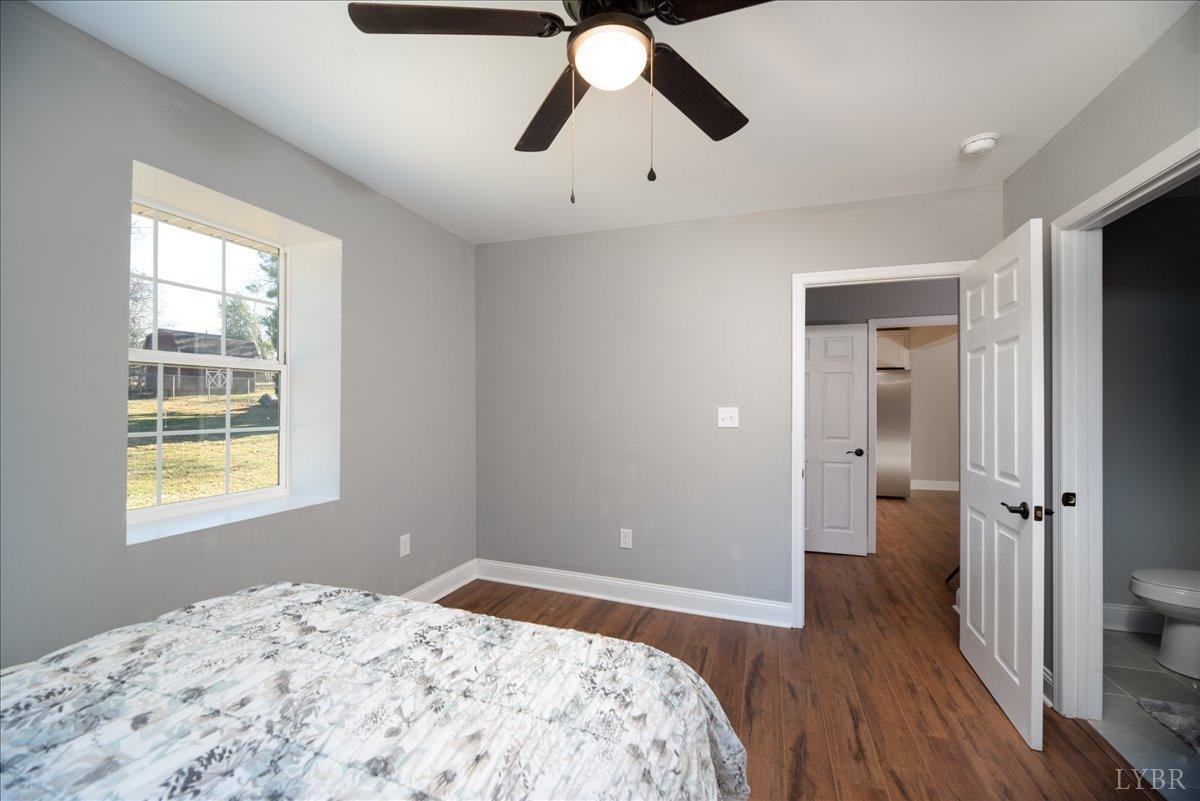 132 Spring Street Madison Heights, VA 24572 - Photo 23 of 63 a bedroom with a bed and a window