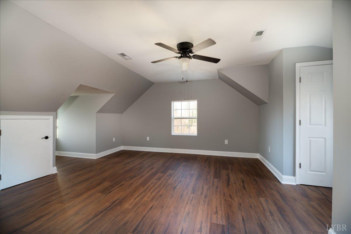 132 Spring Street Madison Heights, VA 24572 - Photo 29 of 63 a view of empty room with wooden floor and fan