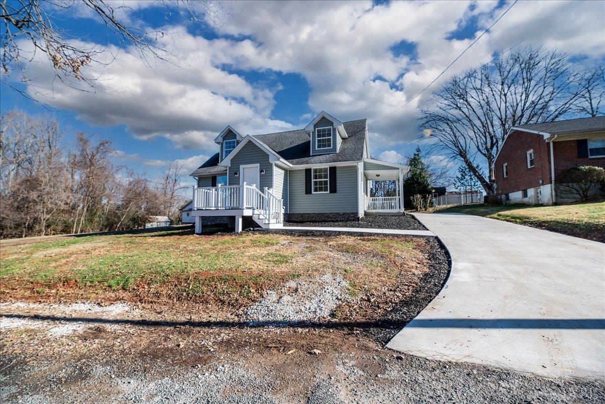 132 Spring Street Madison Heights, VA 24572 - Photo 42 of 63 a front view of a house with a yard