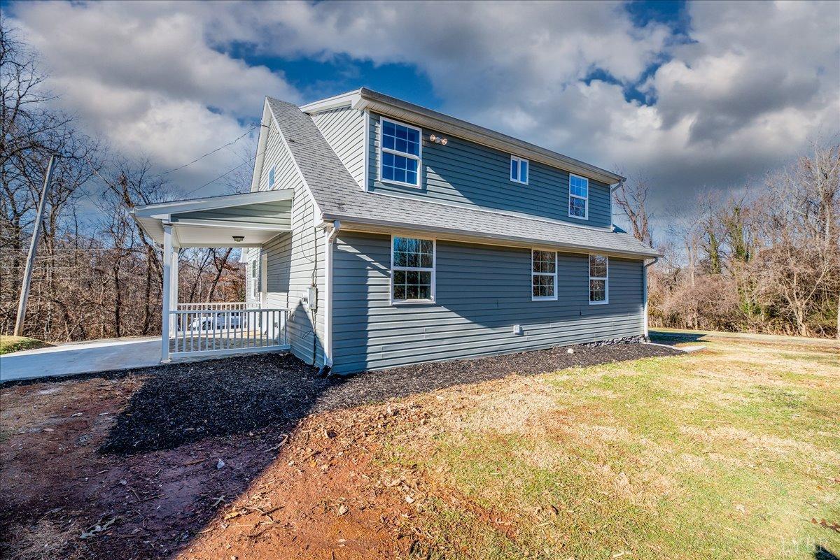 132 Spring Street Madison Heights, VA 24572 - Photo 48 of 63 a front view of a house with a yard